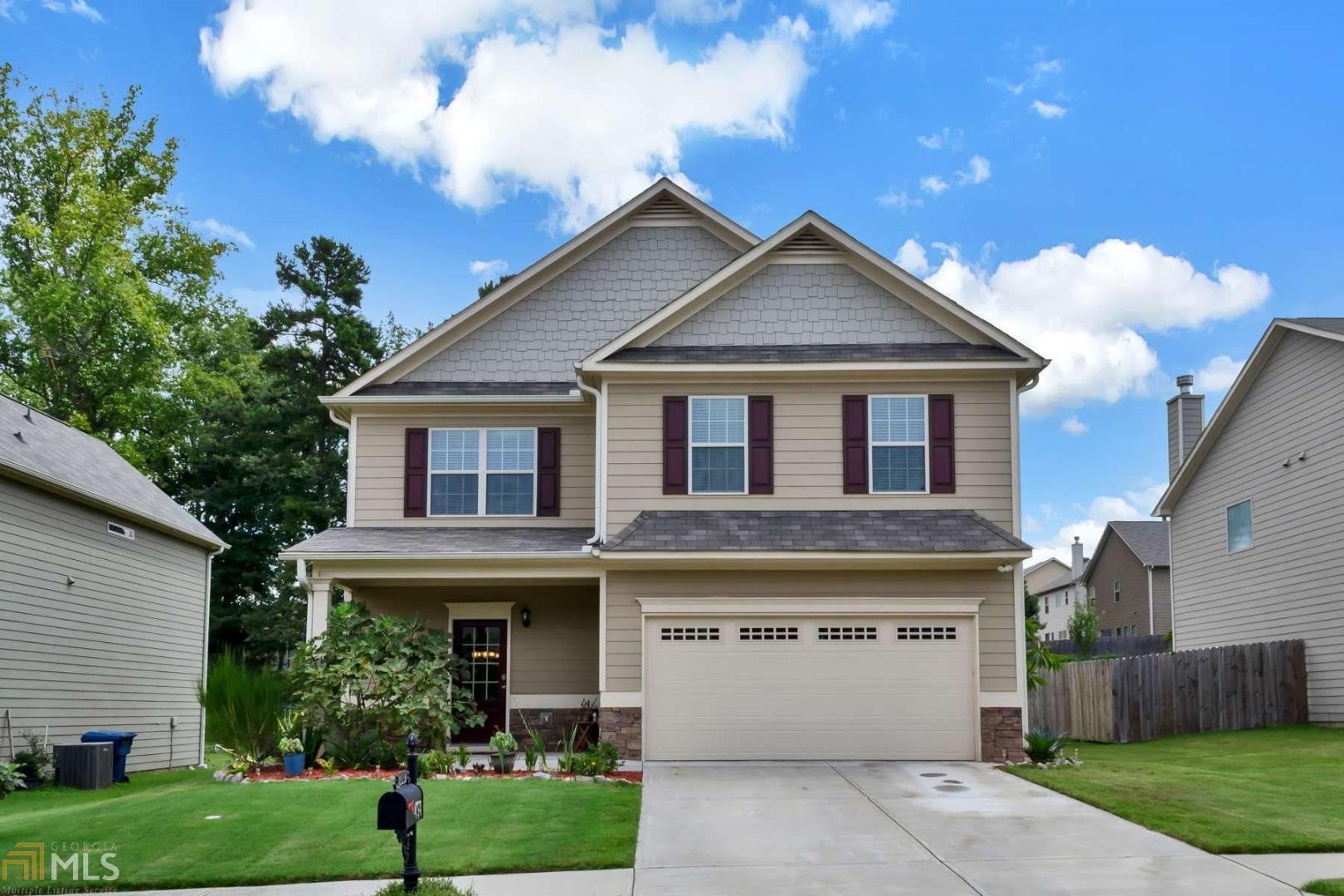 MAJOR PRICE IMPROVEMENT! Gorgeous brick front home with an open floor concept, hardwood flooring with a separate full dining room! Open kitchen with granite counter tops and stainless steel appliances. This beautiful home has been well maintained and offers an over-sized master with a sitting room, huge walk-in closet, separate shower and garden tub. Bring your offers! This home sits in a great neighborhood and award winning school district. Just 1 mile away from the Lawerenceville Avalon.