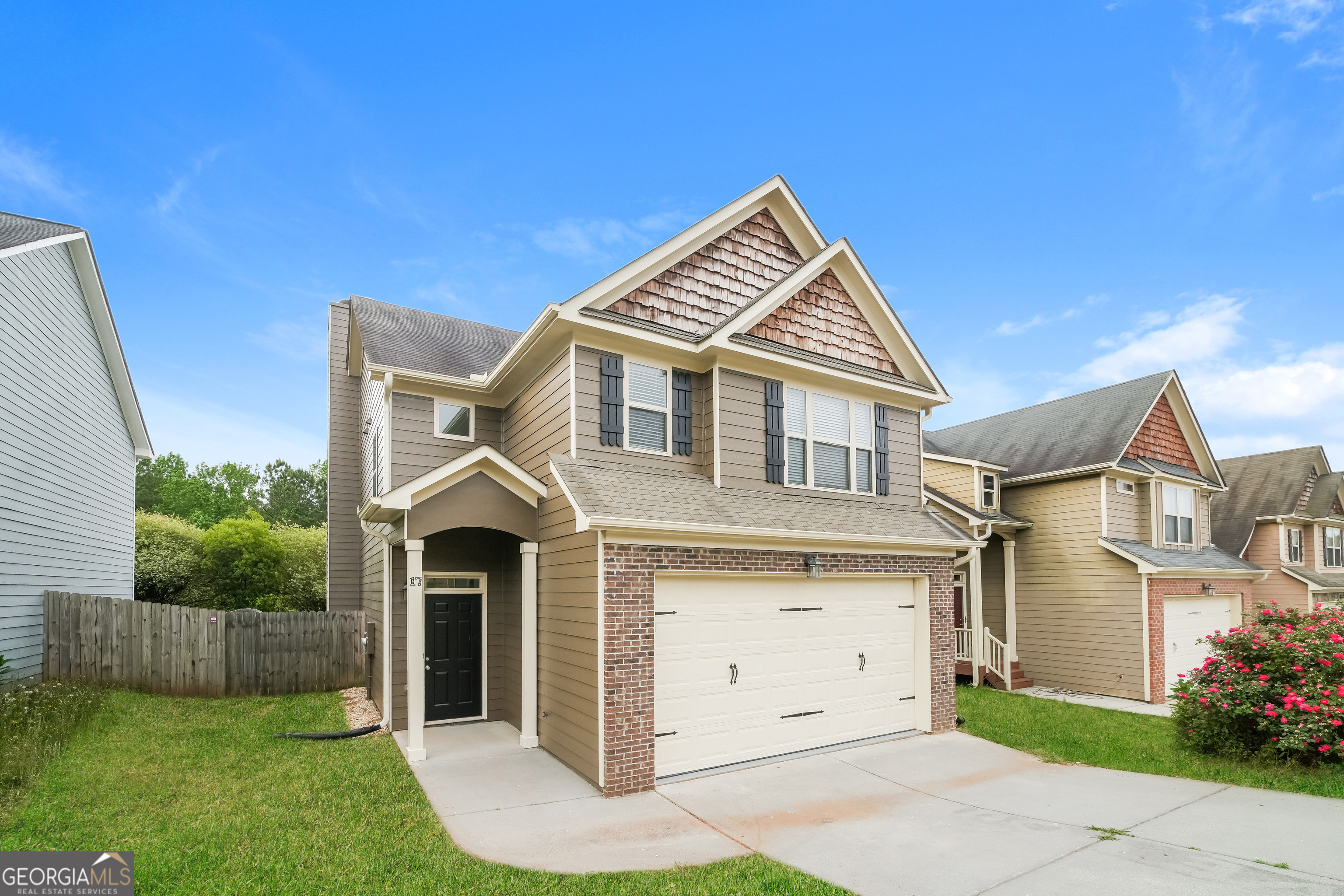 Discover this inviting 3-bedroom, 3-bathroom pet-friendly home with 1,666 sq. ft. of comfortable living space. The kitchen is equipped with stainless steel appliances, including a refrigerator, microwave, range oven, and dishwasher. Beautiful white cabinets with granite counter tops and a back splash. Relax at the fireplace. Enjoy the convenience of an attached garage and the charm of a fenced yard. Ceiling fans and window coverings add to the home's appeal. Schedule a tour today and make this space your new home!