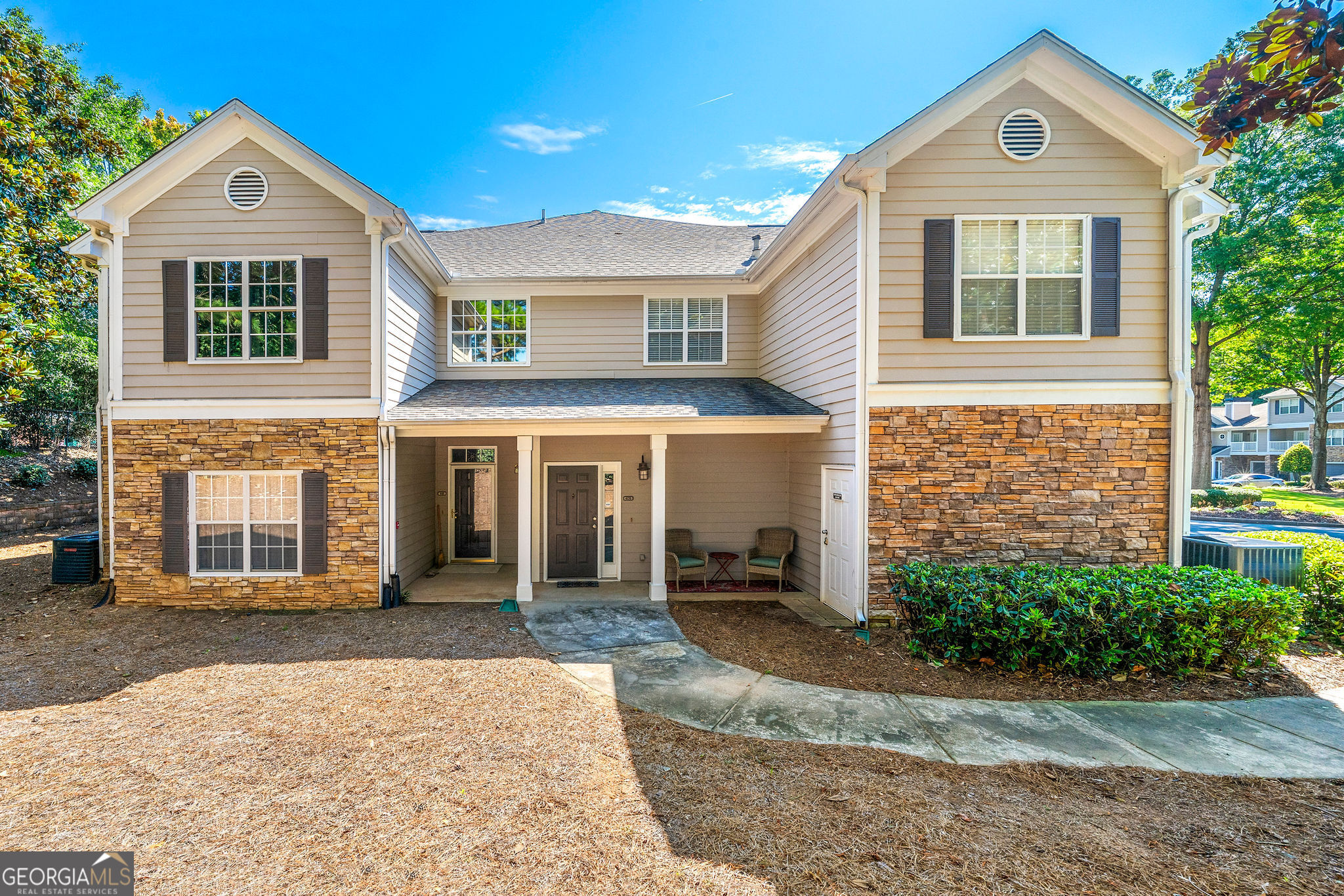 Remodeled 2 bedroom/2 bath condo in the Towne Lake Area. Condo is Close to popular Downtown Woodstock with multiple restaurants, shops, outdoor amphitheater, walking trails and more! Walk to Movie theater, shopping and dining. Home features newly painted interior. Kitchen is open dining and family room. Family Room features Vaulted ceilings and cozy fireplace and opens to a covered back deck. Room mate floor plan. Updated Master bath with granite counters and walk in shower. Separate laundry off the kitchen. End unit with extra space in garage.