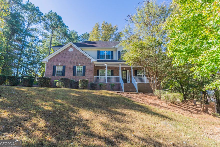 Beautifully updated 4-bedroom, 3-bath home featuring fresh interior paint, new light fixtures, LVP flooring, and carpet throughout. The kitchen offers painted cabinets and new quartz countertops, while bathrooms have been refreshed with modern touches. Enjoy a sunken living room with a cozy fireplace, elegant wainscoting in the formal dining room, and a spacious backyard deck perfect for entertaining.