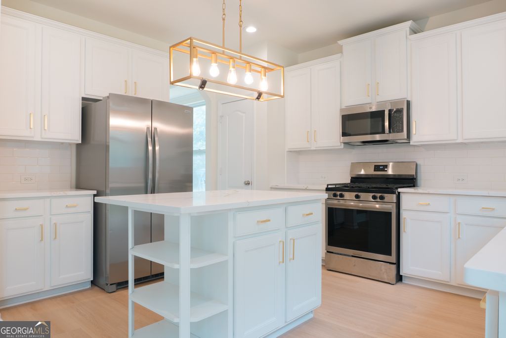 Photo of 530 Simonton Crest Drive, Lawrenceville, GA 30045 (MLS # 10770910)