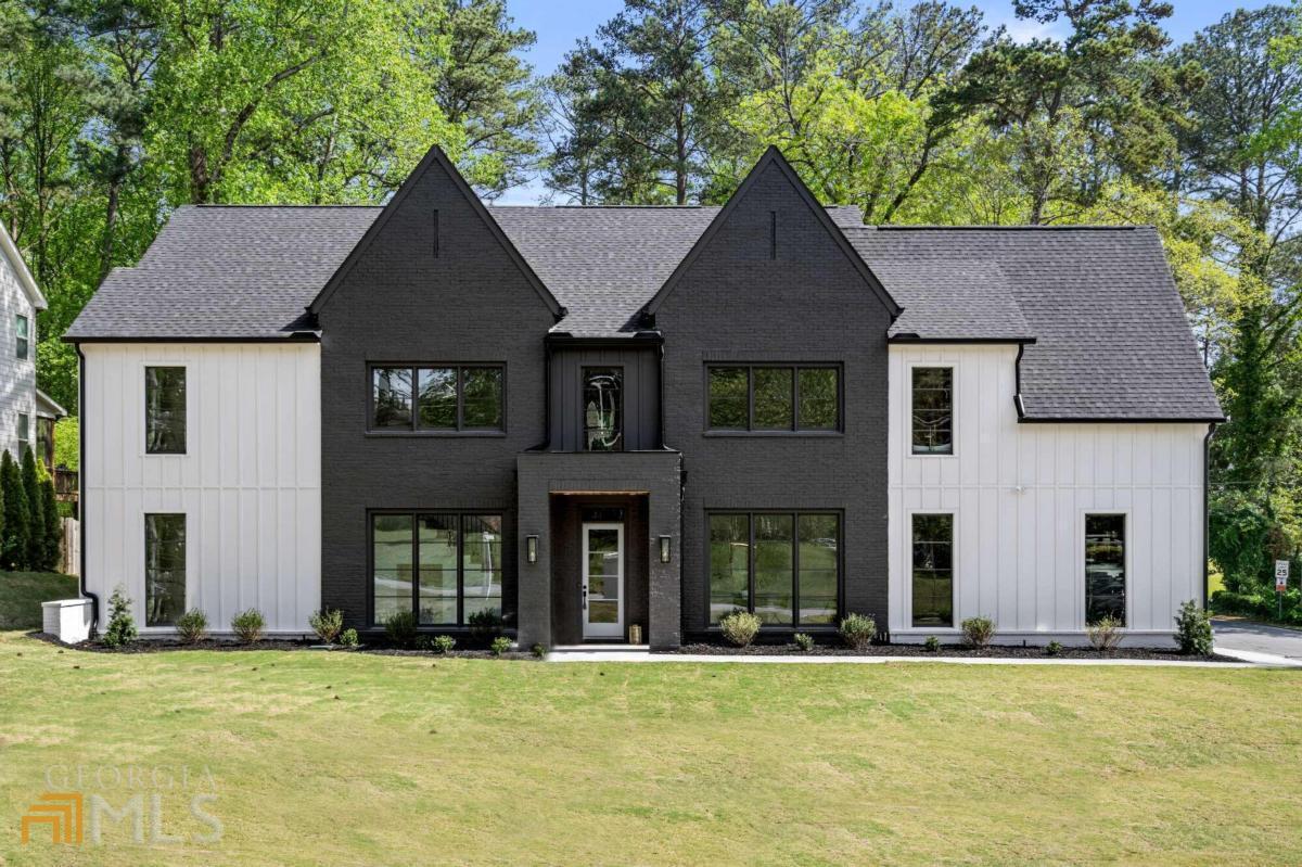 Situated in Brookhaven in the coveted Ashford Park neighborhood sits this stunning 6 bed/4.5 bath new construction home on a large CORNER LOT. This home offers exceptional design and top-notch craftsmanship. The modern farmhouse exterior will draw you in with a charming front porch and lush landscaping. A grand entryway welcomes you in, with an open floor plan featuring high ceilings, white oak flooring, and oversized windows that flood the space with natural light. You will fall in love with this entertainers paradise which perfectly blends the family room, dining area, outdoor lounge, along with the gourmet chef's kitchen. The kitchen features custom cabinets, high-end stainless steel appliances, a walk-in pantry, a large island, and a unique wet bar/wine room. Upstairs an elegant owner's suite awaits with an indulging spa-like bathroom and massive walk-in closet. In addition, there are three secondary bedrooms with beautiful light, ample closet space, and dedicated ensuite bathrooms. There is also a large loft that would be perfect for a media room or play area. A mix of smart hardscaping and intricate landscaping composes the rear outdoor oasis, complete with a covered lounge and outdoor fireplace. THIS LOT CAN ALSO ACCOMMODATE A POOL. Located minutes from excellent shops, restaurants, and schools that Brookhaven has to offer!
