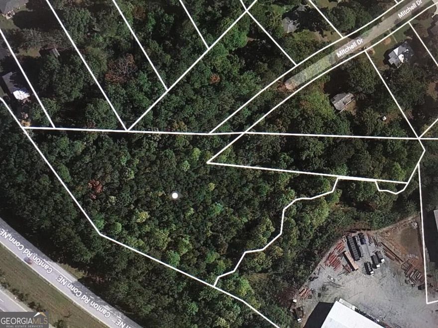 Excellent Opportunity on this 1.93 acre lot currently zoned LI.  Lots of possabilities including residential build site. Located ate the end of the street.  Esay access to downtown Marietta, I-75 and I-575.  Co-agent is owner and acting as principle.