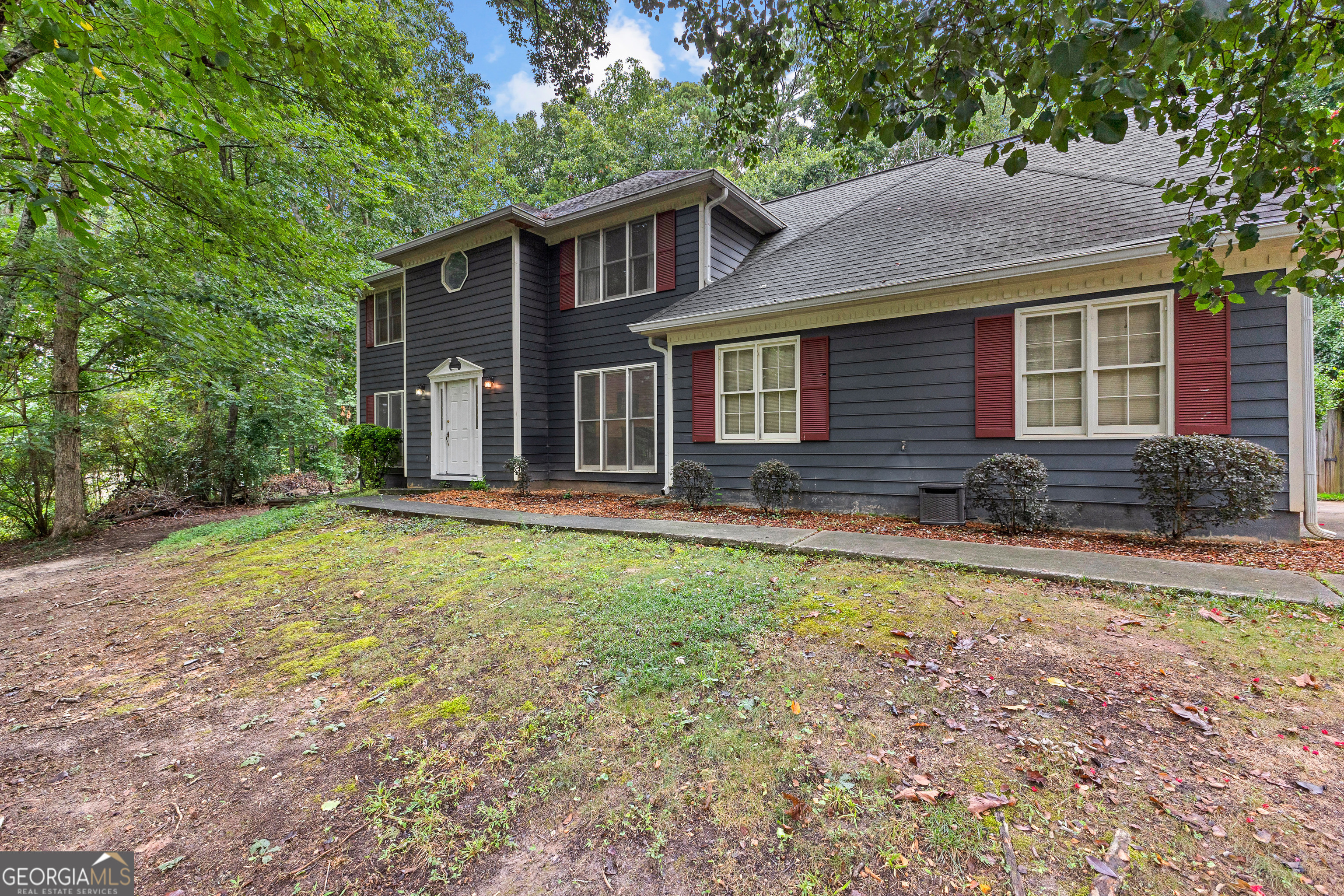 Location, Location, Location! This traditional, 2 story, 3 bedroom, (possible 4th) 2.5 bath home is located in the quaint, Cottonwood Subdivision, at the end of a beautiful tree lined cul-de-sac. The home features a large living room with built in bookcases, wood burning fireplace, and French doors leading to the sunroom overlooking the parklike backyard. Separate dining room, large kitchen, and 1/2 bath and laundry room accessible to both the garage and pool area complete the main floor. Outside you will find a deck, which is adjacent to the kitchen and sunroom, which leads you to the beautiful inground, diving pool. Upstairs, you will find the Primary suite with large en-suite and walk in closet with shelving. Two additional bedrooms, a bonus room (possible 4th bedroom), and large updated bathroom complete the 2nd floor. The home is centrally located just minutes from the Fayetteville Pavilion, fine Restaurants, and enjoyable Entertainment.