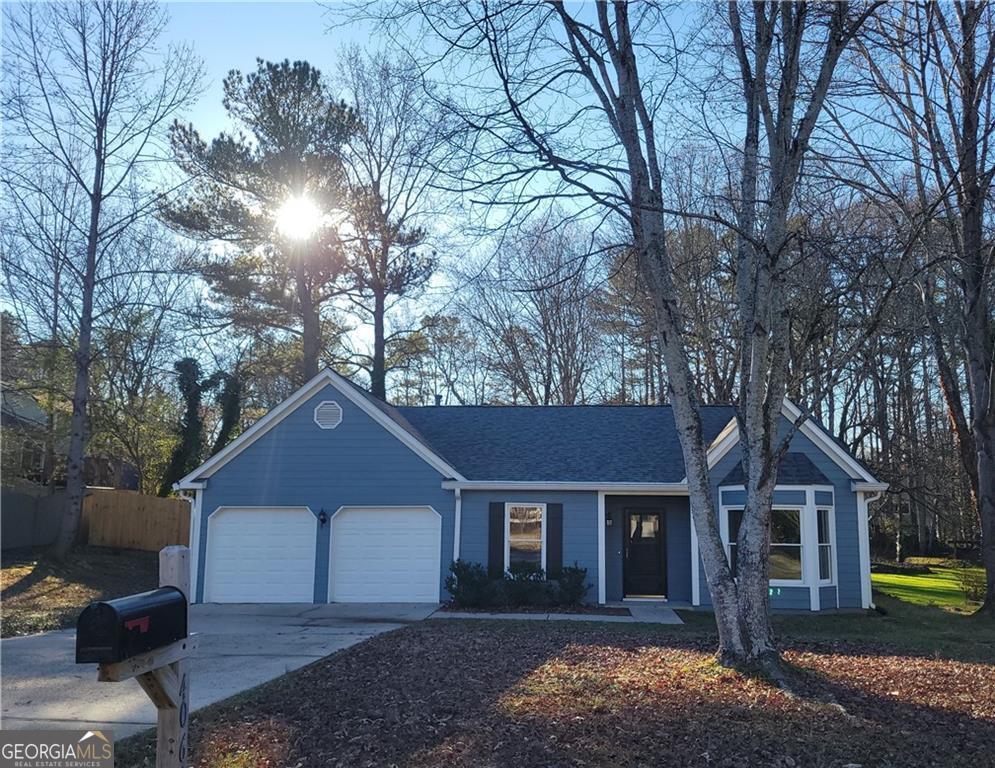 Freshly painted 3 bed, 2 bath ranch home with brand new flooring. The large Kitchen has plenty of cabinets and counter space. A breakfast bar frames the wide opening to the family room. The gas-starter, wood-burning fireplace sets the mood for cozy evenings and holidays. The HUGE fenced backyard is sure to keep fur babies and other family and friends very happy. The house is zoned for award-winning East Cobb schools: Keheley Elementary, McClesky Middle, Kell High School.