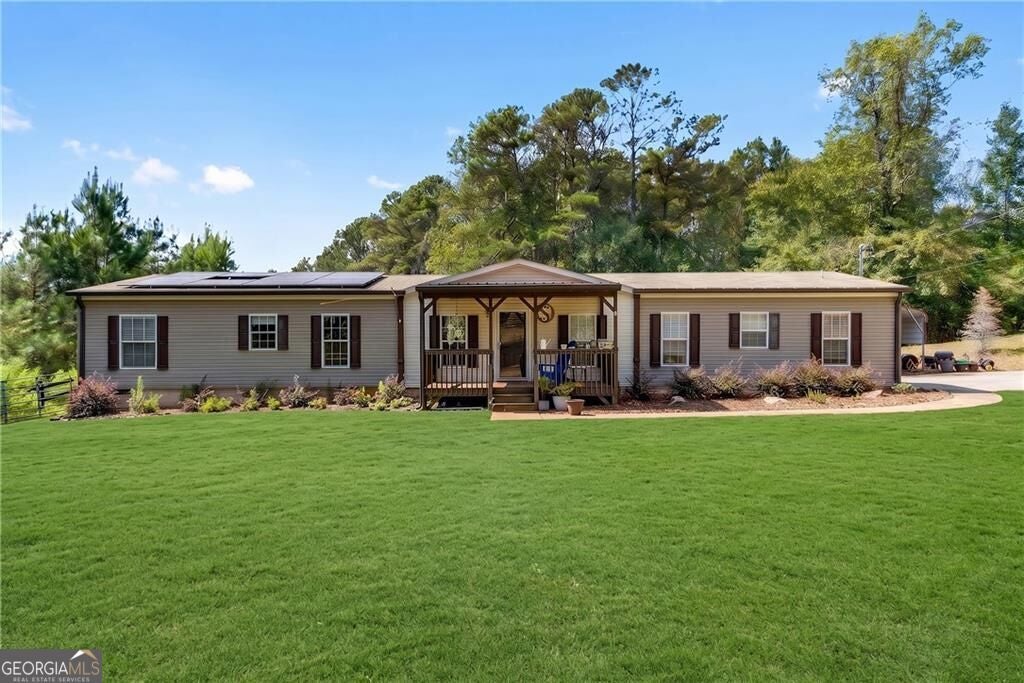 Photo of 4353 Flatbottom Road, Ball Ground, GA 30107 (MLS # 10850503)
