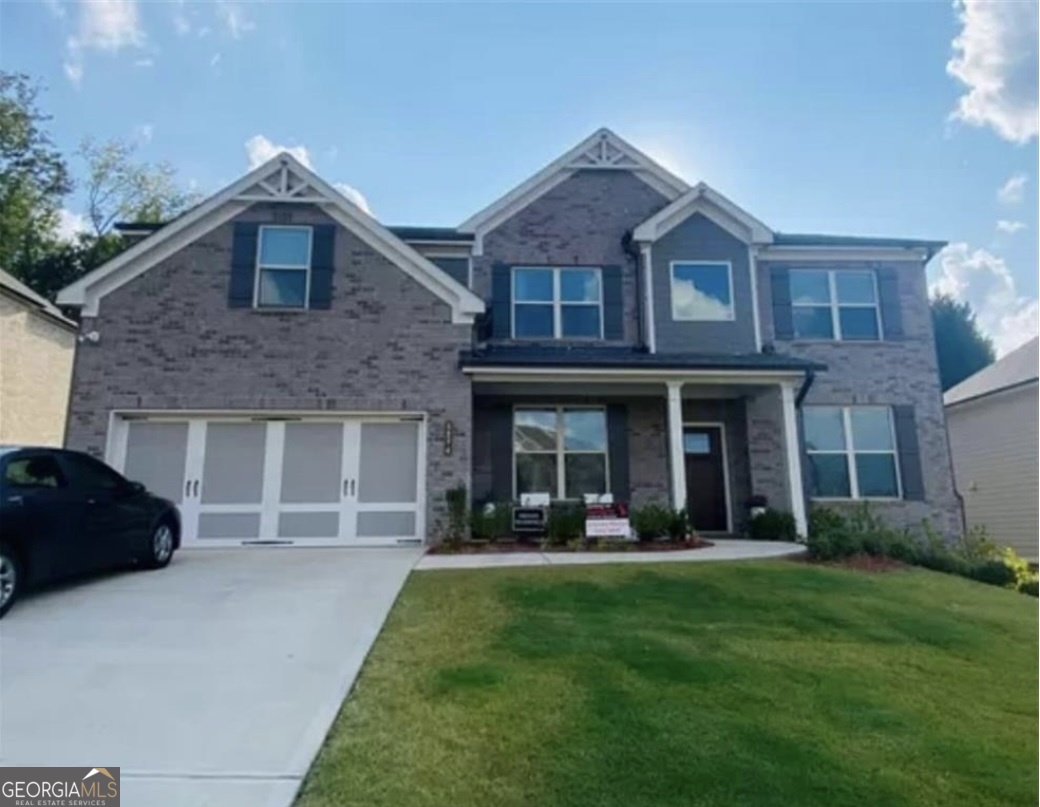 BEAUTIFUL BUILT SINGLE FAMILY HOME in highly Sought after North Gwinnett HS District. 5BR/3BA. Guest Bedroom on Main w/Full Bath. Two Story Foyer, Large Great Room with Coffered Ceilings open to Beautiful Kitchen. Kitchen offers 42" White Cabinets, Stainless Steel Appliances including Double Ovens, Gas Cooktop and Dishwasher. Herringbone Backsplash, Upgraded Lighting & Trim Package, 5" Hardwoods Floors on the Main Floor living areas. Oak Treads on Stairs including Decorative Wrought Iron Spindles. Massive Owner's Suite gives room for Sitting Area. Master Bath is an Owners Dream Tile Floors and Shower, Granite Countertops. Huge Master Closet Huge Upstairs Loft provides that Second Family Room. Two Secondary Bedrooms share a Jack & Jill Bath. Large Secondary Bedroom with private Full Bath. Oversized Screened and Covered Rear Porch overlooking Private Backyard. No Description would do this house Justice. Each applicant in the household needs to submit separate application. No smoking allowed. Pets allowed. Minimum lease 6 months, longer lease possible. PLEASE NOTE: The schools assigned to this are Riverside Elementary, North Gwinnett Middle School and North Gwinnett High School. Zillow is wrongly showing it as Lanier High.