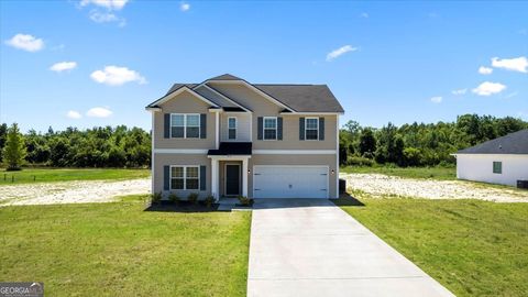Photo of 414 Summerhill Drive NE, Ludowici, GA 31316 (MLS # 10673213)
