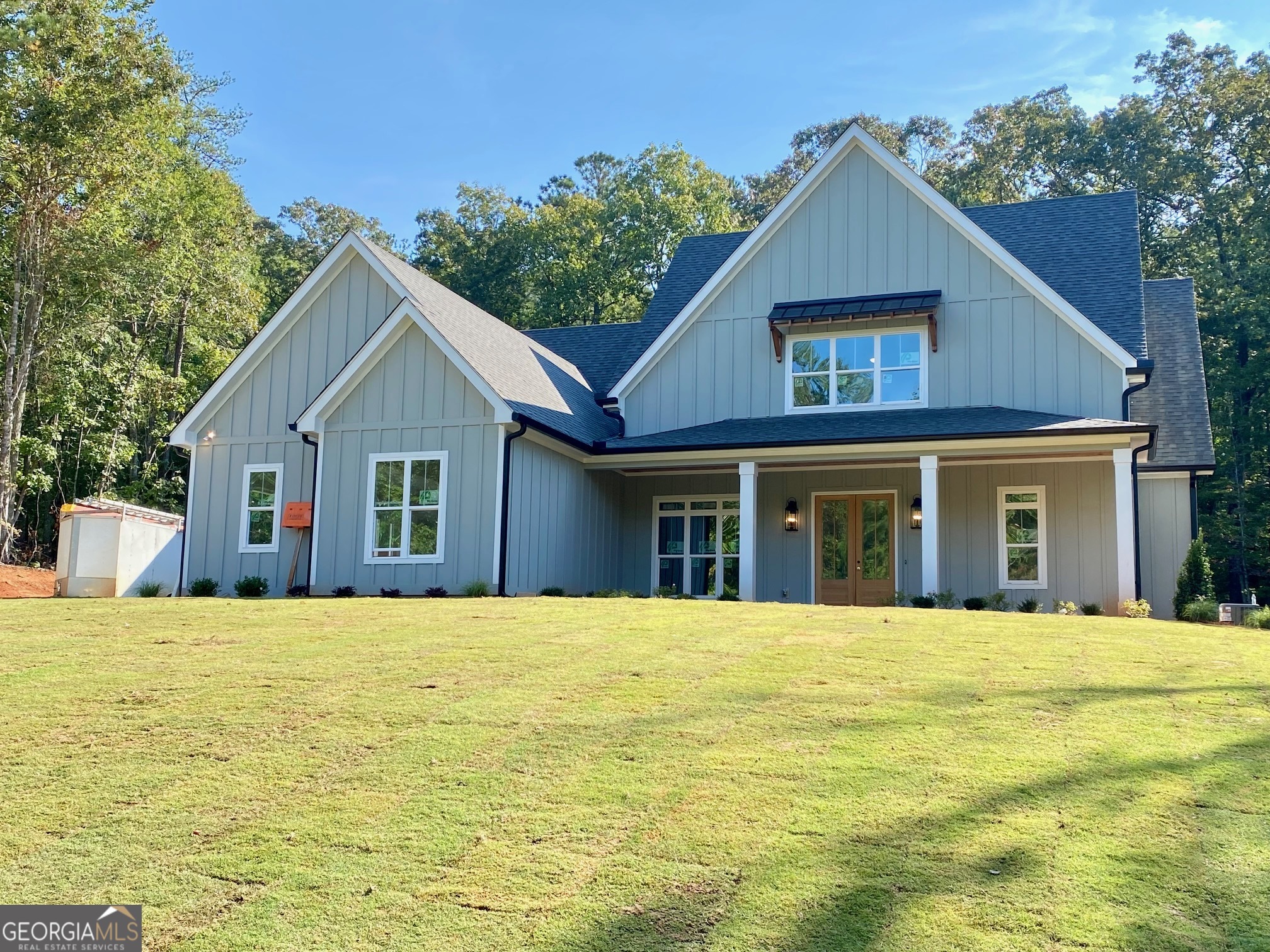 WONDERFUL, NEW PLAN WITH FLAT BACKYARD IN SOUGHT-AFTER NORTHSHORE AT LAKE REDWINE*4 BEDROOM/3.5 BATH*3 CAR GARAGE*CONSTRUCTION NEARING COMPLETION*MASTER SUITE AND OFFICE WITH TRIM DETAIL ON MAIN & 3 ADDITIONAL BEDROOMS/2 BATHS, LOFT & MEDIA ROOM UPSTAIRS*MASTER SUITE BOASTS LOTS OF NATURAL LIGHT WITH WINDOWS OVERLOOKING THE BACKYARD*MASTER BATH PROVIDES DOUBLE VANITIES & "WET ROOM" W/ HUGE TILED SHOWER & SOAKING TUB*BEAUTIFUL SELECTIONS THROUGHOUT, INCLUDING CUSTOM CABINETRY, HARDWOODS GALORE, DESIGNER-SELECTED COUNTERTOPS, LIGHTING, PLUMBING FIXTURES*TILED BATHS AND LAUNDRY*LARGE COVERED PORCH ACCESSED THROUGH TWO SETS OF FRENCH DOORS OFF OF LARGE GREAT ROOM*FABULOUS OUTDOOR STONE FIREPLACE*PROFESSIONALLY DESIGNED AND INSTALLED LANDSCAPE PLAN INCLUDES IRRIGATION AND SOD ON ALL SIDES OF HOME! COME EXPERIENCE THE LIFESTYLE YOU WILL NOT WANT TO LEAVE WITH THE AMAZING AND UNIQUE AMENITIES OF NORTHSHORE AT LAKE REDWINE! AMENITIES INCLUDE 300 ACRE PRISTINE LAKE WITH ELECTRIC MOTOR BOATING, SWIMMING & FISHING, BEACH ENTRY SWIMMING POOL WITH SPLASH PAD & FOUNTAINS, PLAYGROUNDS, LIGHTED TENNIS AND PICKLEBALL COURTS, SIDEWALKS & STREETLIGHTS THROUGHOUT!