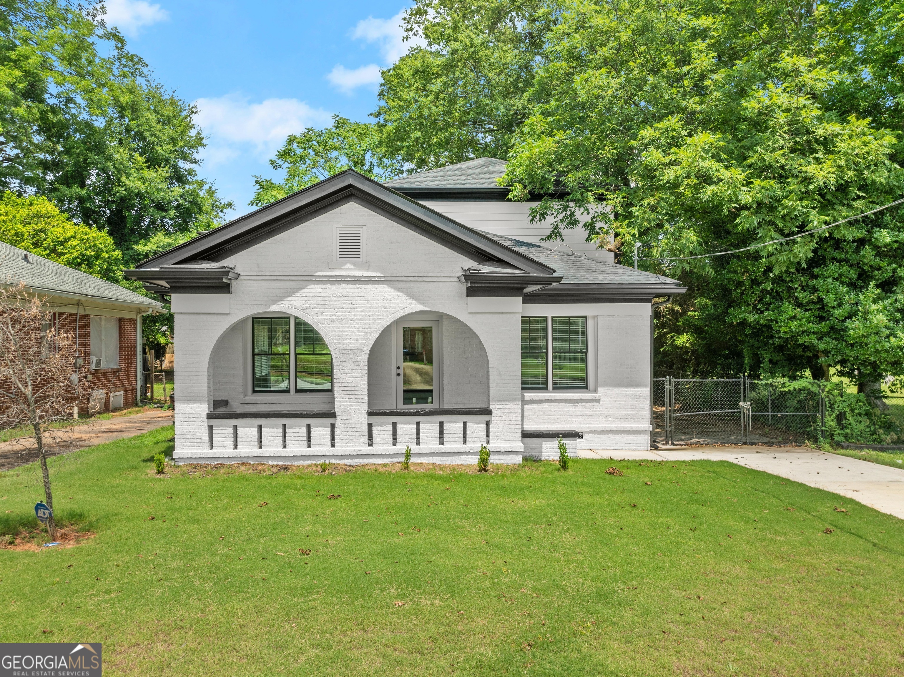Fully Renovated Historic Bungalow in Prime Location - Only 10 Mins from the Airport & Six West! Welcome to 1740 Langston Avenue - where timeless 1930s charm meets modern luxury in the heart of Sylvan Hills! This beautifully renovated 5-bedroom, 4-bath bungalow is the perfect blend of historic character and contemporary flair, offering the lifestyle today's buyers crave. Step inside to an open-concept living space that's warm, inviting, and perfect for entertaining. The living and dining areas flow seamlessly into a stunning chef's kitchen featuring quartz countertops, a large island, modern lighting, custom cabinetry, and a built-in microwave - every detail thoughtfully designed for both beauty and function. The spacious main-level owner's suite is a retreat of its own, complete with dual closets and a spa-inspired en-suite bath showcasing a freestanding soaking tub and a luxurious oversized two-person shower you'll fall in love with. Upstairs, you'll find three additional bedrooms, two full baths, and a large open loft area - ideal for a playroom, reading nook, or second living space. Need a home office or guest suite? The flex room on the main level easily serves as a fifth bedroom and is conveniently located next to a full bathroom - a rare find in homes of this style! Out back, enjoy summer evenings or morning coffee on the brand-new deck overlooking a private backyard, perfect for relaxing or entertaining. Location is everything, and this one checks every box - just 10 minutes to Hartsfield-Jackson Atlanta International Airport and the highly anticipated $1.5 Billion Six West development in College Park! Walk to the BeltLine, hop on MARTA just steps away, and enjoy quick access to I-85, I-285, and I-75. You'll love the friendly, walkable neighborhood, full of neighbors out walking dogs or jogging to local coffee shops and eateries. Bonus: This home qualifies for a $10,000 non repayable Grant from Truist Bank and/or 100% financing with zero down payment - ask for details and lender information! This home can be yours with no money out of pocket!!! Agents, bring your buyers and get them under contract before July 15th and receive a $3,000 bonus! Don't miss your chance to own this one-of-a-kind beauty in one of Atlanta's fastest-growing neighborhoods. Schedule your tour today and experience everything 1740 Langston has to offer!