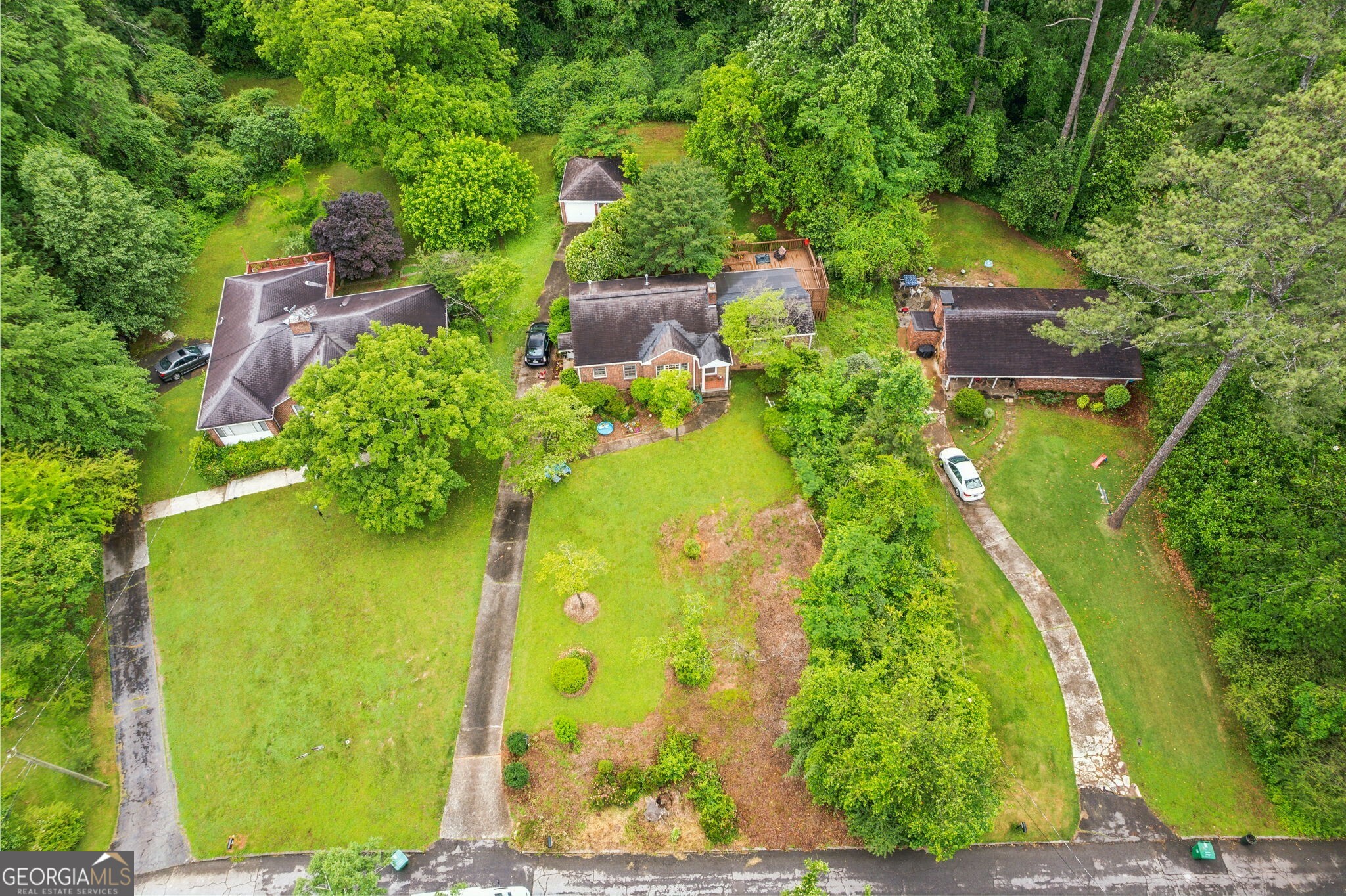 NEW PRICE!! DEVELOPERS/BUILDERS/INVESTORS!! Introducing an EXCEPTIONAL NEW CONSTRUCTION/NEW BUILD OPPORTUNITY IN UNINCORPORATED DEKALB!! This exclusive assemblage of +/-4.32 acres under a single owner presents the perfect canvas for the construction of single-family homes (R-100) or building a custom dream home in this well-established, quiet neighborhood. For Investors: Currently comprising five well-maintained tenant-occupied properties ( Parcels include: 1213,1209,1205,1201 and 1195 McConnell Dr., with rent-roll available) Current lot sizes range from 0.554 acres to 1.145 acres. Conceptual design drawings, survey, and topo are available. The property is NOT in a flood plain. Newer construction homes in the neighborhood have recently SOLD for over $1M. Nearby neighborhoods with new construction SOLD homes ranging from $1-3M. This prime real estate listing offers convenience to Emory Hospital and University, the new Children's Healthcare of Atlanta- Arthur M. Blank Hospital, Atlanta VA Medical Center, the CDC, reputable public and private schools, various parks and recreational opportunities, including easy access to all major highways and Hartsfield-Jackson Atlanta Airport. Ideally situated close to the popular Toco Hill Shopping Center, numerous restaurants/taverns, DeKalb Farmer's Market, Fernbank Museum, DeKalb History Center, and many others. A short drive to Buckhead, Midtown, Emory Village, and Decatur Square. Don't miss out!