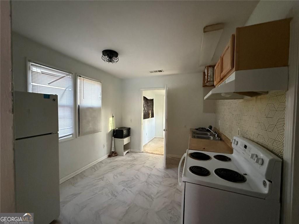 Photo of 1356 Almont Drive SW, Atlanta, GA 30310 (MLS # 10707366)