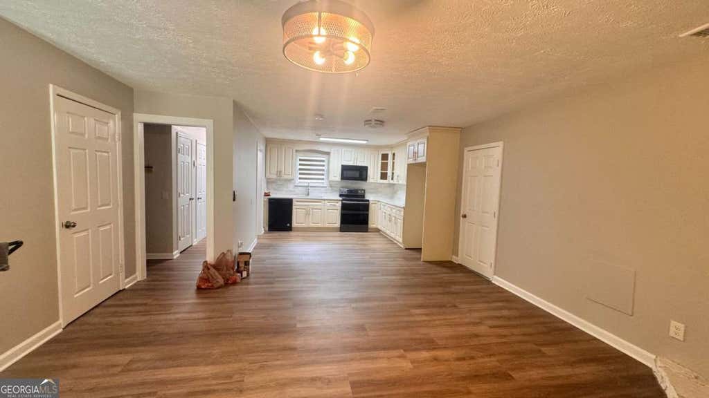 Photo of 4091 Big Valley Trail, Stone Mountain, GA 30083 (MLS # 10797529)