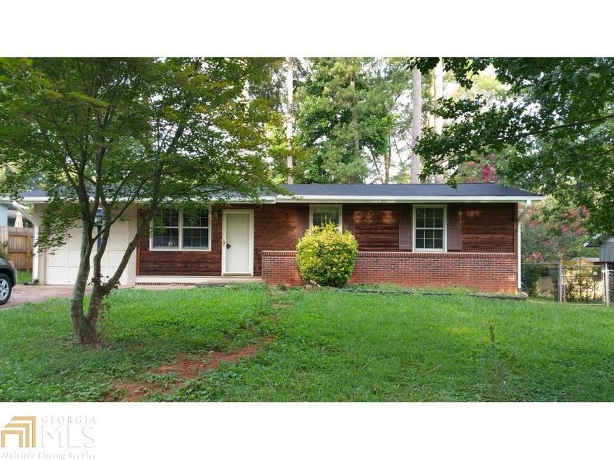 Great 3/1 inside the perimeter in sought after neighborhood and school districts. Ranch style house for easy access. Recently updated. New Laminate Floors 1 car garage gives easy access to kitchen. Kitchen looks into den with easy access to dining room and front living room. Separate laundry room with storage. French doors in den open onto the large deck and yard. Great yard for parties and entertaining. Fully fenced for the furry friends! Outside storage for lawn equipment. Unfinished exterior entrance basement is great for extra storage. Come and see this great rental.