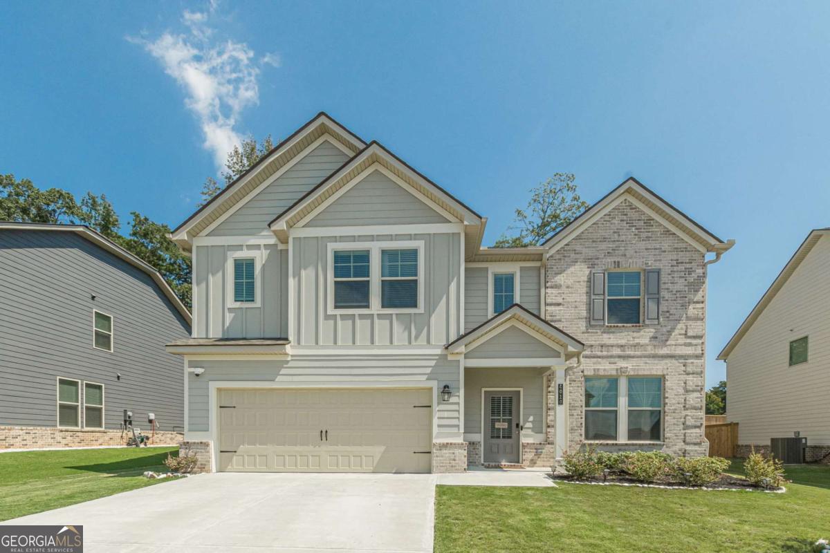 Welcome to this 2024-built home offering modern design, spacious living, and a prime Fayetteville location. With 4 bedrooms, 3.5 bathrooms, and high-end finishes throughout, this home is perfect for families looking for both comfort and style. The main level offers a bright and airy open-concept floor plan, featuring LVP flooring that flows effortlessly through the spacious family room and gourmet eat-in kitchen. Perfect for entertaining, the kitchen boasts sleek quartz countertops, a large island with breakfast bar, a big size pantry, and premium stainless steel appliances, including a gas cooktop, double oven, built-in microwave, and more. Enjoy cozy evenings by the electric log fireplace or host memorable dinners in the formal dining room with its stunning coffered ceiling. Upstairs, you'll find four generously sized bedrooms and three full baths, including a luxurious primary suite with a walk-in closet, dual vanities, and a spa-like soaking tub your personal retreat after a long day. A full-sized laundry room adds convenience to your daily routine. Step outside to a private, fully fenced patio that's perfect for relaxing or entertaining. The beautiful retaining wall adds character and charm, creating a cozy atmosphere. At the heart of the space is a fire pit ideal for gathering with friends and family on cool evenings. Whether you're hosting a summer cookout or enjoying a quiet night under the stars, this outdoor space is designed for making memories. Located in one of Fayetteville's most desirable areas, this home is just a short walk to Kroger and minutes from Fayetteville's best shopping, dining, and entertainment. Spend weekends at the Line Creek Bus Barn enjoying live music, explore the shops and restaurants at Trilith Studios, or catch a show at the Fayetteville Amphitheater. With easy access to Peachtree City, Senoia, I-85, and Hartsfield-Jackson Atlanta International Airport, you're perfectly positioned for convenience and connection. Don't miss this opportunity to own a move-in ready home that blends style, comfort, and location! MOTIVATED SELLERS!!!!