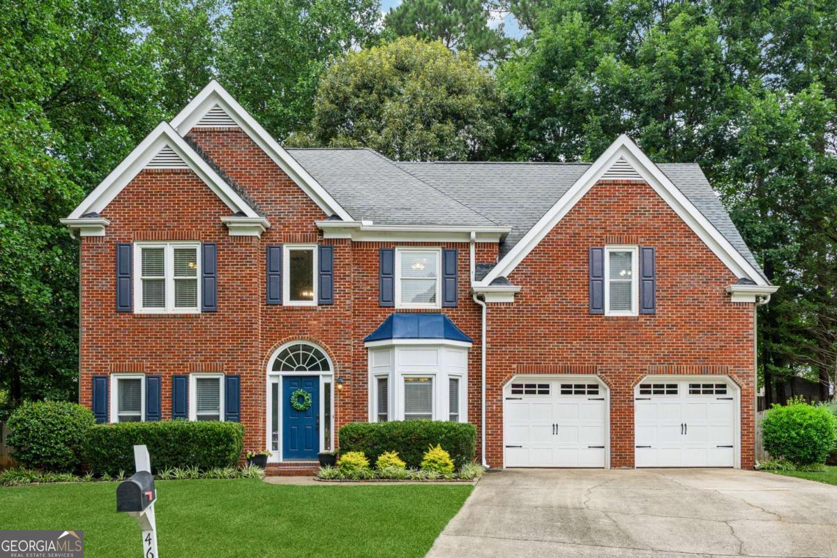 Welcome to this beautifully maintained 4-bedroom, 2.5-bath brick home, perfectly situated on a large, level lot offering incredible privacy. Step inside to find an inviting layout featuring two spacious living areas, including a cozy family room with a fireplace-ideal for relaxing or entertaining. The updated kitchen boasts granite countertops, stainless steel appliances, breakfast bar and opens to a charming breakfast room, perfect for casual meals. Retreat to the oversized master suite, complete with a serene sitting area and his/hers walk-in closets. Expansive ensuite master bath features dual sinks, make up vanity, stand-in shower and garden tub. Large secondary bedrooms provide comfort and flexibility for guests, family, or a home office. Enjoy the completely renovated guest bath, showcasing elegant quartz countertops, a stylish new vanity and well-chosen tile flooring. Outside, you'll love the spacious deck and the private flat backyard-ideal for outdoor entertaining, play, or simply enjoying your oasis. This home blends modern updates with timeless charm-don't miss the opportunity to make it yours! Close to major highways, shopping, restaurants, downtown Acworth and downtown Kennesaw. Neighborhood has community pool, tennis and pickleball courts, as well as playground.