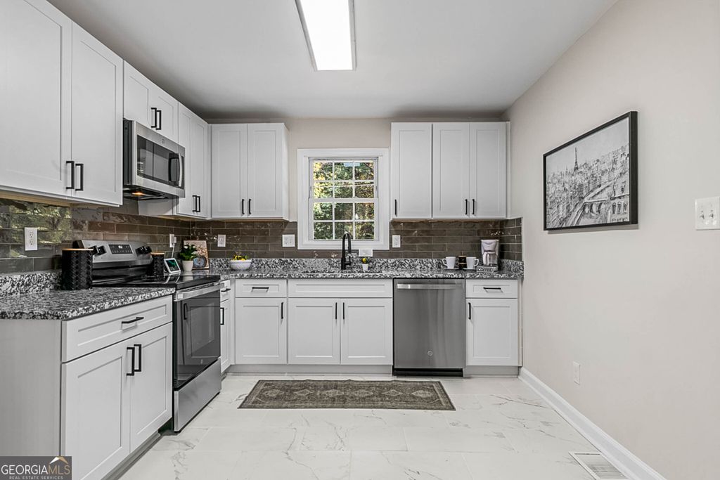 Photo of 1576 S Gordon Road, Austell, GA 30168 (MLS # 10629839)