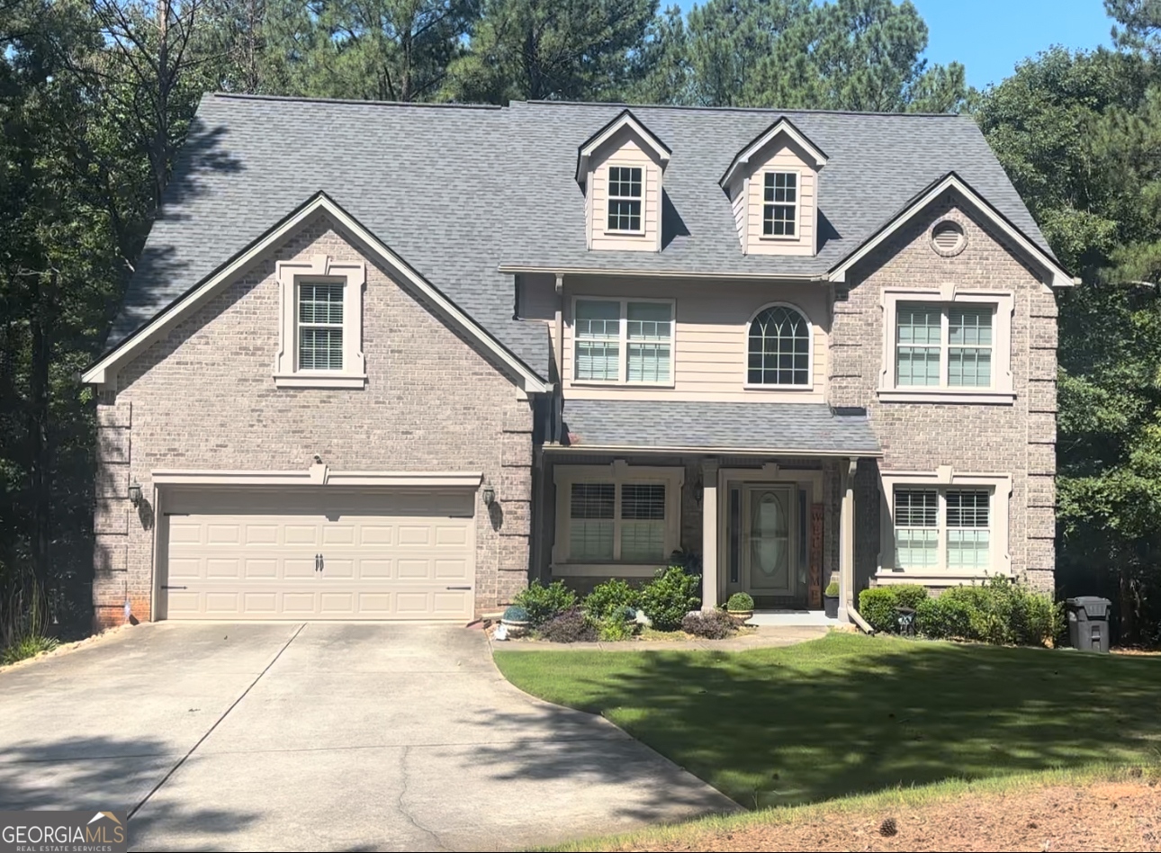 Gorgeous, immaculate, elegant, and beautiful home, with a 3-sided brick wall and concrete siding, situated in a quiet neighborhood. Property is seated on a one (1+) acre of land, with no HOA restrictions! This property will not stay long in the market. Gain access into the property through a spacious foyer/hallway with gleaming hardwood floor, into a 20-foot cathedral ceiling in the family living room, with a gorgeous fireplace. First room on the right with a French-door as you work into the building, could serve as home office as well. Directly across the hall is the dining room space, perfect for entertainment and making memories. Main floor has a self-contain private room that could serve as a guest room or an overflow of space. There is enough illumination all around the house. Master-chef Kitchen comes with all stainless-steel appliances, granite countertops and tile back-splash. Kitchen also comes with upgraded designed kitchen island with built-in shelves for additional storage, built-in cutting board. Seller added this designed kitchen Island after purchase. Work-in pantry. Wooded floor throughout main level and up to the kitchen area. The family room shows the beautiful stylish staircase that leads to the various bedrooms upstairs. Two (2) secondary bedrooms connected by a Jack & Jill bathroom with a private area. The large, oversized master suite, complete with it's luxurious master bedroom, and its own sitting area, comes with an attractive double trey ceiling that accentuates the open and spacious area. Large spacious master bathroom with a jetted soaking tub and a glass shower area. Master bath with multi-level double vanity with knee space for a stool. Master suite also has a spacious work-in closet. His & Hers wash area. The deck off the breakfast area overlooking the private and wooded backyard, with full basement. The backyard space for BBQ, exploring and catching a glimpse of wildlife. It's a place to behold and to call a home. Also, seller is leaving porcelain tile for the new home owners to complete the basement floors.