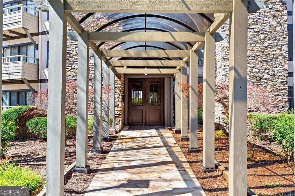 Photo of 1214 Highland Bluff Dr. SE Drive SE #214, Atlanta, GA 30339 (MLS # 10676428)