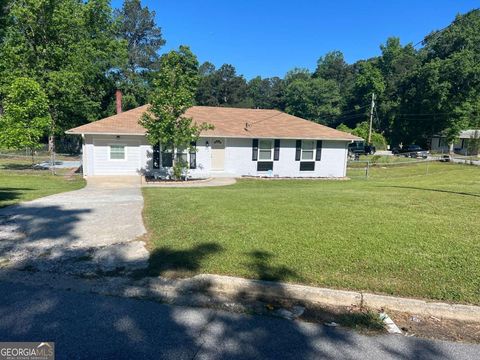 Photo of 2875 Carriage Lane, Atlanta, GA 30349 (MLS # 10753208)