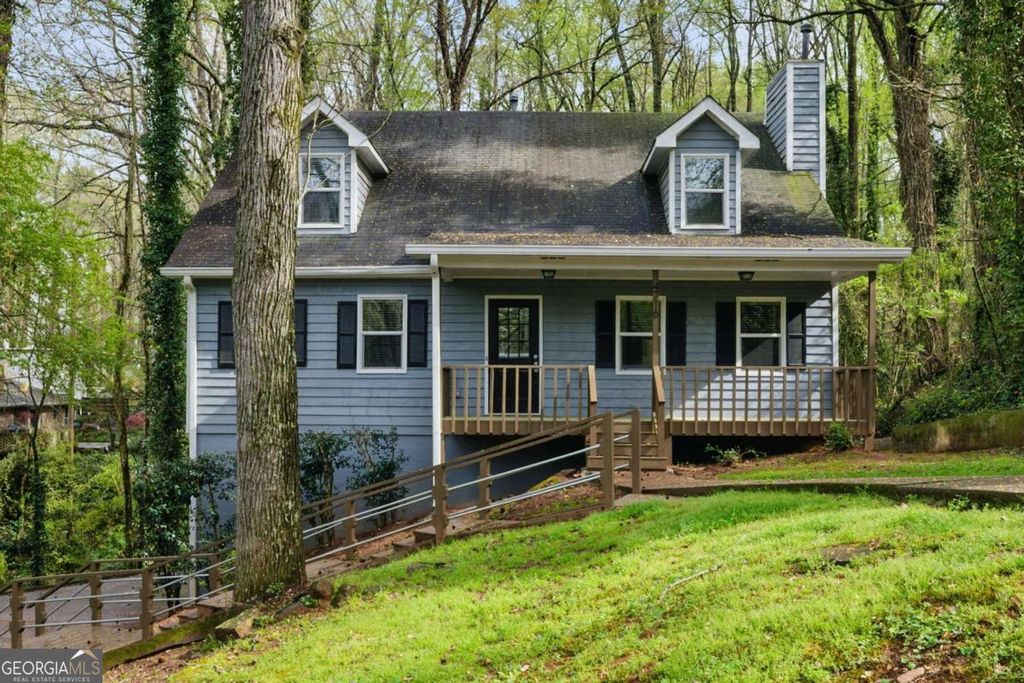 Photo of 4716 Alpine Drive SW, Lilburn, GA 30047 (MLS # 10673779)