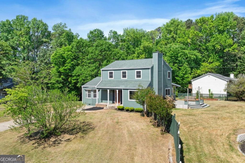 Photo of 1274 W Wylie Bridge Rd, Woodstock, GA 30188 (MLS # 10739912)