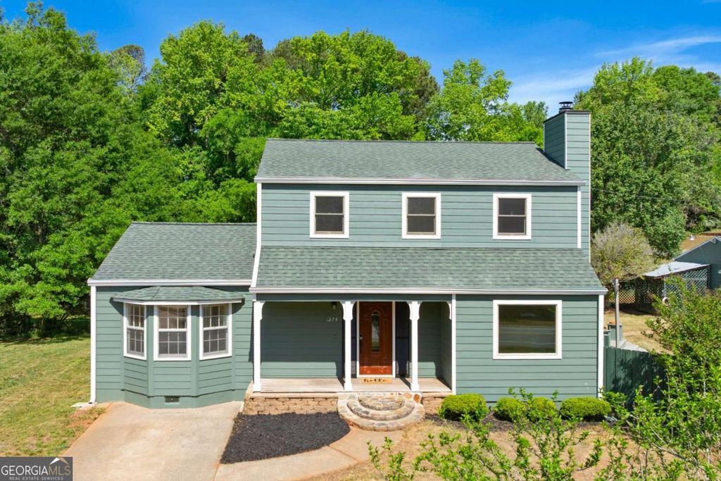 Photo of 1274 W Wylie Bridge Rd, Woodstock, GA 30188 (MLS # 10739912)