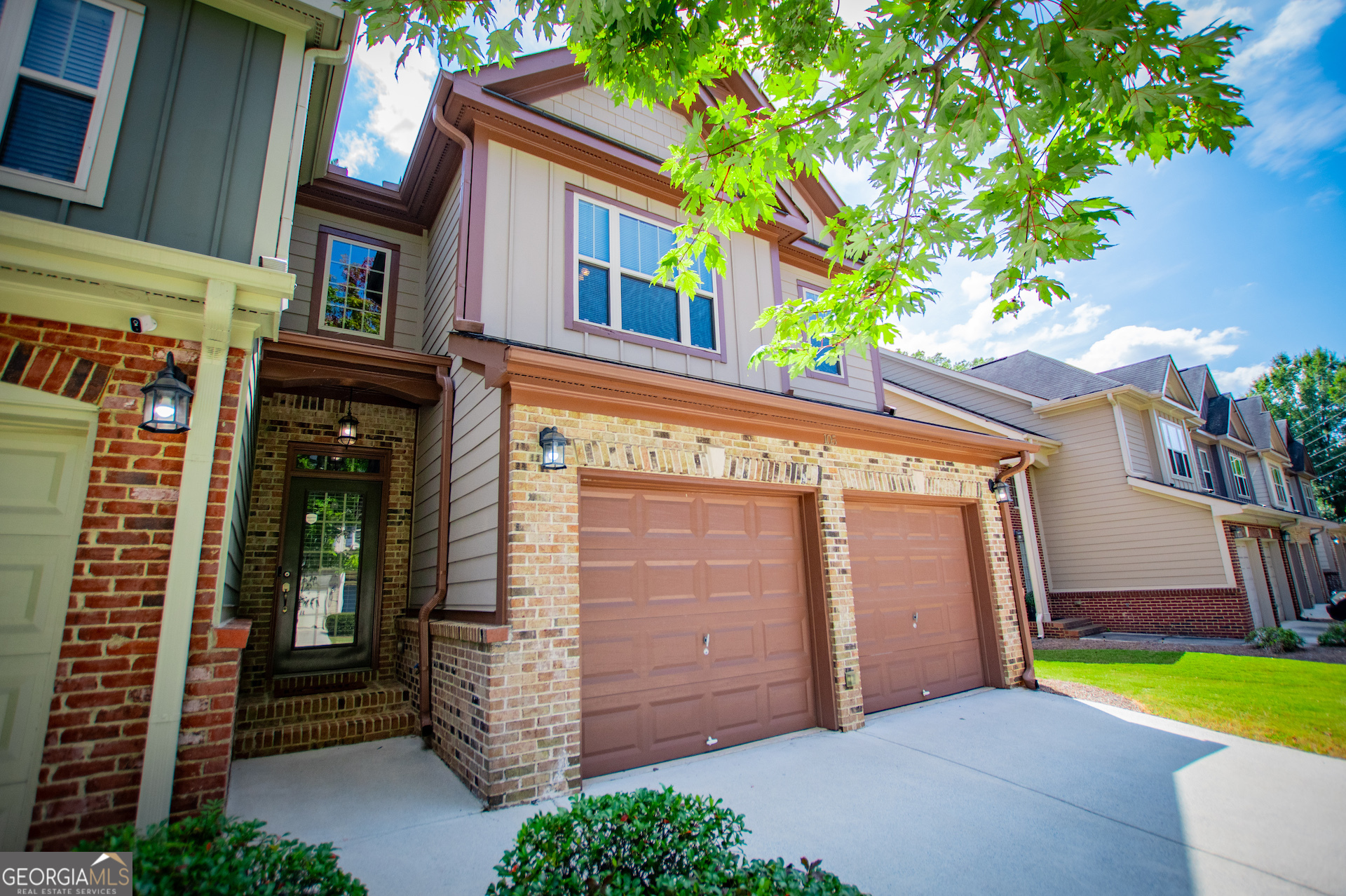 Freshly painted and move-in ready, this 2 bedroom, 2.5 bath townhome offers low-maintenance living with plenty of space and comfort. Step inside to a welcoming 2-story foyer with gleaming hardwood floors that flow throughout the home. The well-appointed kitchen features granite counters, a breakfast bar, and a sunny breakfast room, while the formal dining room provides space for entertaining or everyday meals. The spacious family room is inviting with a fireplace and gas logs, accented by arched openings and trey ceilings that add both character and charm. Upstairs are two oversized bedrooms, each with its own ensuite. The primary retreat includes a versatile sitting area that could double as a home office or reading nook, along with a huge walk-in closet. The luxurious renovated primary bath features dual vanities, a tile shower, and a garden tub. The secondary suite is just as spacious with dual sinks, a large shower, and a walk-in closet-perfect for guests or roommates who value their own space. The gated community provides peace of mind and features a swimming pool for recreation. The HOA takes care of exterior maintenance, lawn care, termite protection, water, and trash service-making homeownership simple and stress-free. All this, just minutes from shopping, dining, schools, entertainment, and easy interstate access for a smooth commute. Don't let this amazing home pass you by, schedule your viewing today!