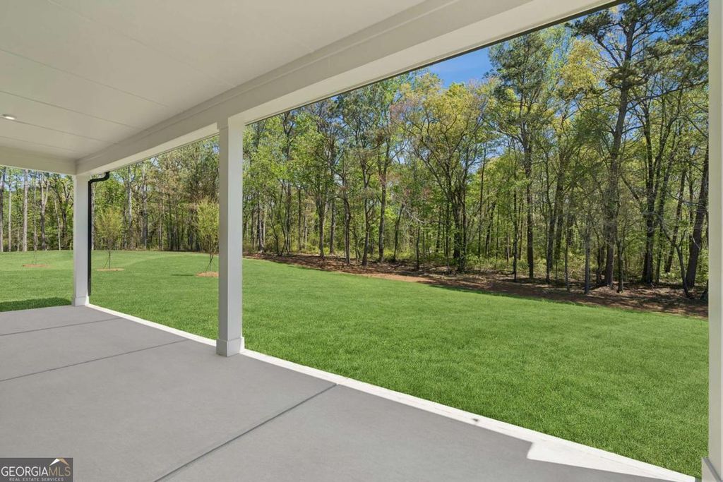 Photo of 7385 Magnolia Crest Ln, Cumming, GA 30028 (MLS # 10775564)