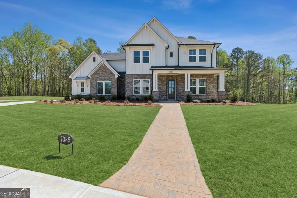 Photo of 7385 Magnolia Crest Ln, Cumming, GA 30028 (MLS # 10775564)