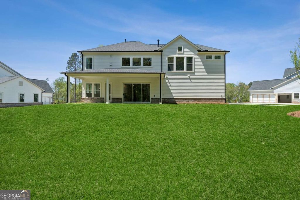 Photo of 7385 Magnolia Crest Ln, Cumming, GA 30028 (MLS # 10775564)