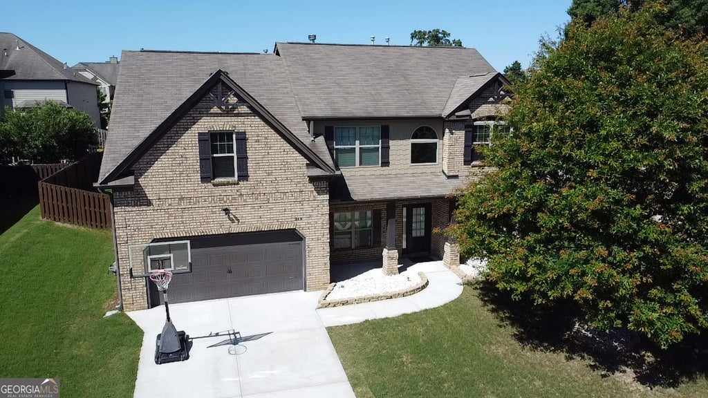 Photo of 219 Traditions Drive, Loganville, GA 30052 (MLS # 10772719)