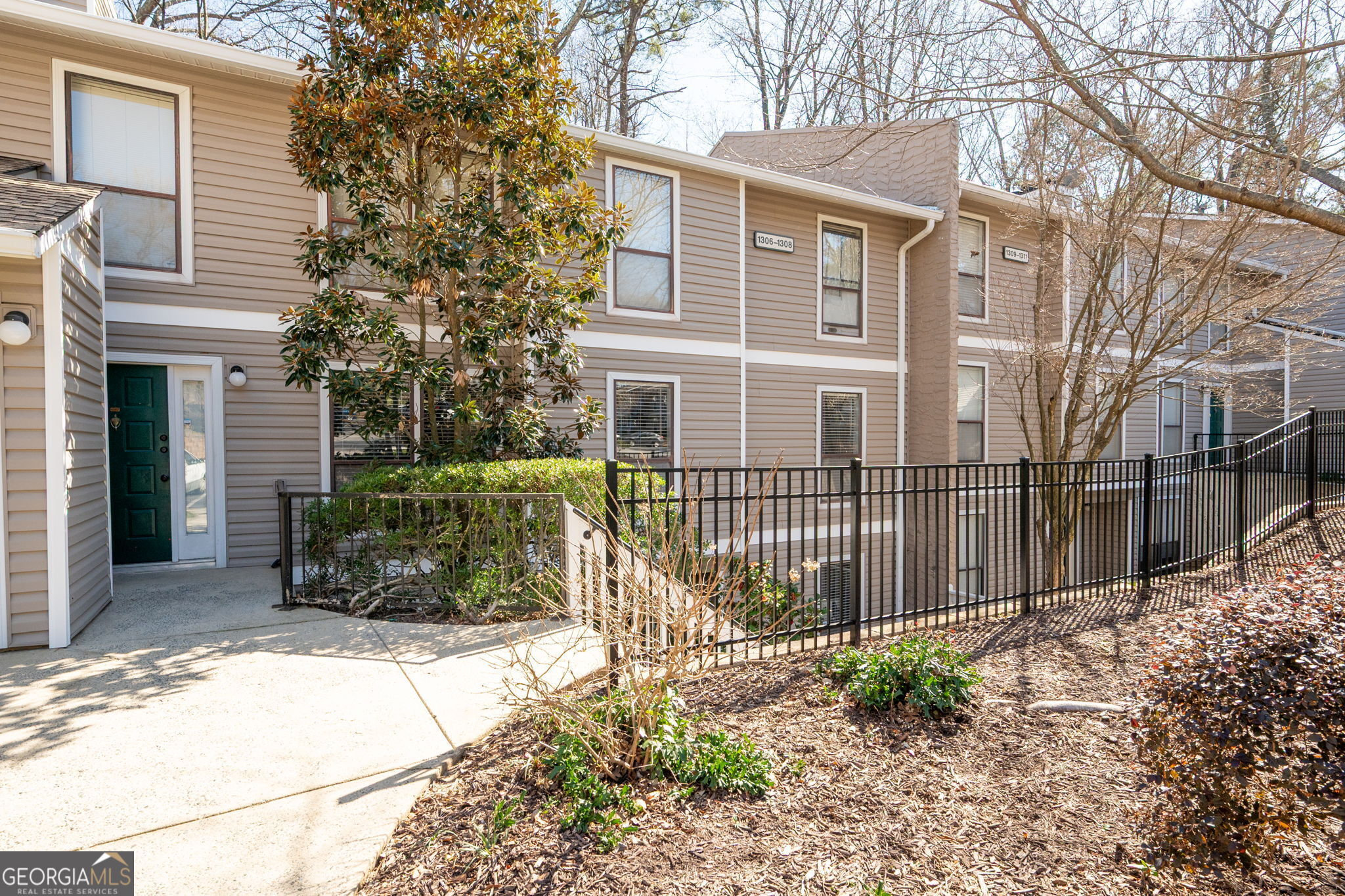 This beautifully modernized home in the well-maintained Wynnes Ridge swim/tennis community offers updated features throughout. Fresh paint, new flooring and lighting create a welcoming atmosphere while the kitchen and bathrooms add a contemporary touch. The open-concept living area is filled with natural light, perfect for entertaining. The kitchen boasts new kitchen cabinets, stone counter tops, a newer oven range and stainless steel appliances. A large flex space is ideal for an office, in-home gym or secondary living area. Both the primary and secondary bedrooms offer ample space, with the primary featuring a large walk-in closet and a fully updated en-suite bath with a free-standing shower. A brand new HVAC system and hot water heater ensure comfort year-round. Located in a quiet neighborhood, this home is close to shopping, interstates, hiking trails and the Battery.