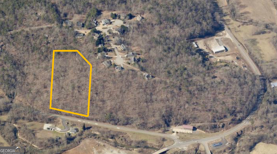 3.5 ACRES IN CITY OF DAHLONEGA. ZONED HIGHWAY BUSINESS - MOST USES INCLUDING BOTH COMMERCIAL AND RESIDENTIAL ARE ALREADY ALLOWED WITHOUT REZONING. CAN ALSO BE SOLD TOGETHER WITH ADJACENT 5 ACRES FOR A TOTAL OF 8.5 ACRES. OWNER FINANCING AVAILABLE FOR AS LOW AS 20% DOWN AND BALLOON TERM AS LONG AS 10 YEARS! BUY NOW, PAY LATER!!