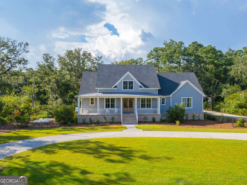 Photo of 105 Jones Creek Drive, Saint Simons Island, GA 31522 (MLS # 10827039)