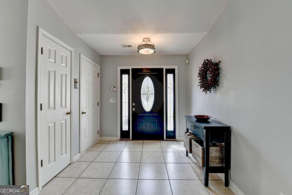 Photo of 6435 Dressage Crossing, Cumming, GA 30040 (MLS # 10664744)