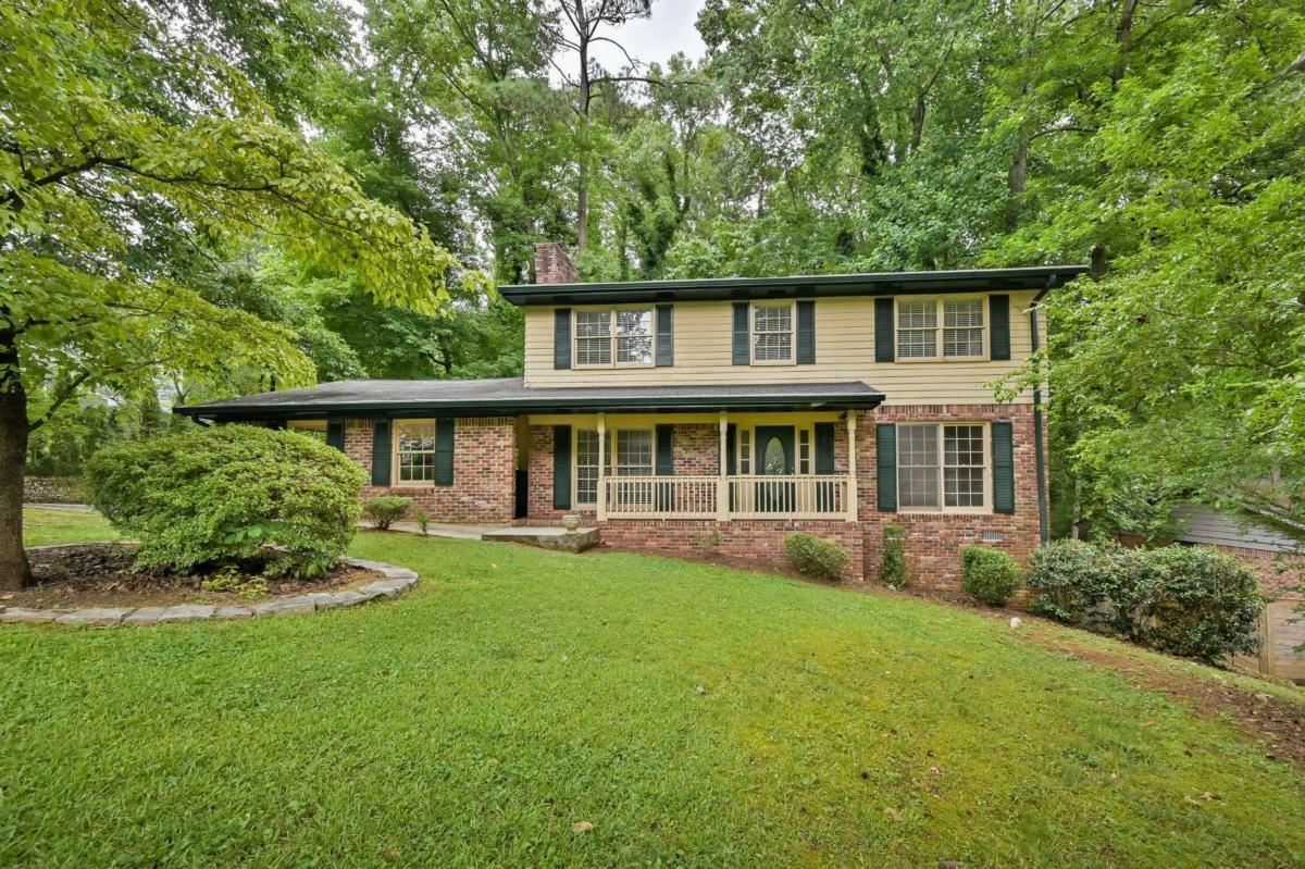 HOME IS OCCUPIED. PLEASE SCHEDULE APPOINTMENT. DO NOT DISTURB TENANTS. Backyard has been fenced in. Welcome home to this beautiful and spacious property in sought after Dunwoody North. This home features hardwood floors and an open floorplan great for entertaining. Natural light flows throughout and highlights the freshly painted contemporary 'agreeable gray' painted walls. An Eat-in Kitchen, separate dining room, large Living Room, formal living room, Crown Molding and wrought iron staircase, large Deck off Kitchen Overlooking Extra large lot but easily maintained wooded backyard with creek, and huge Pantry. Upstairs you will find a Spacious Primary Bedroom Suite with Two Closets, 3 Additional Bedrooms, guest bath AND an Extra Bonus room that will make a perfect office, playroom, craft room, etc. The Finished Basement can be used as an additional bedroom, which includes a full bath and a Separate Entrance. The basement also includes a substantial unfinished storage area. This property is conveniently located to Top Schools, I-285, 141, I-85, GA-400 Marta, Perimeter Mall plus TONS more Shopping, MJCCA, Brook Run Park and SO MUCH MORE. Vintage Lane is a Dead-end Street - So no need to worry about thru traffic. Washer and Dryer included and an additional Fridge in Basement. Home is approx. 2,146 sqft PLUS basement. Landlord requests a minimum 24 month lease.