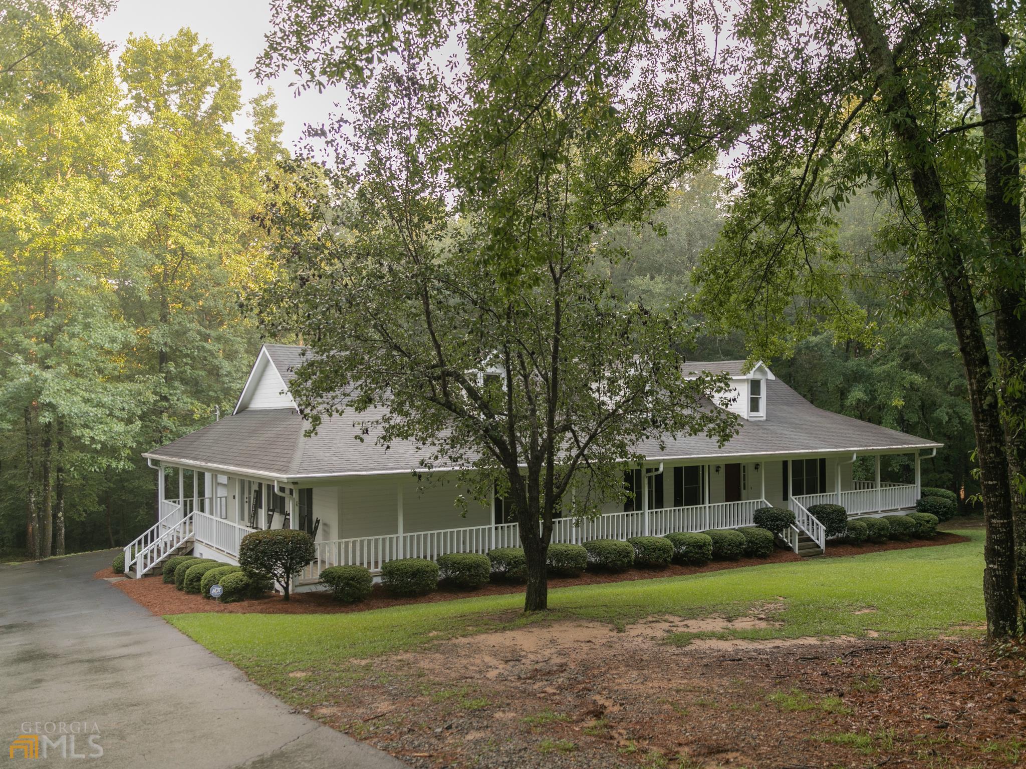 Your dream home in South Monroe County/ Bolingbroke area, on 3.54 Very Private Acres with a creek! One Level with gorgeous porches spanning nearly the entire house, huge back deck with gas line is perfect for grill nights! Split floorplan 3 BR/ 2 BA, HUGE master suite with new dream bathroom! Clawfoot soaking tub, separate shower, his/hers sinks. Separate dining with a beautiful barrel vault ceiling, Large Greatroom with Fireplace overlooking back deck with double set of glass doors for all that great natural light. Kitchen with breakfast area and breakfast bar, pantry with barn doors, wonderful gas cooking range & tankless hot water heater! This southern charmer will not last long! Call today!