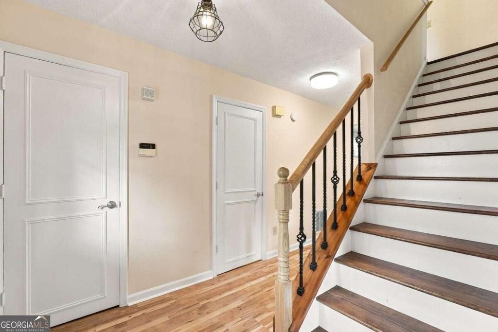 Photo of 5004 Brandlwood CT, Lilburn, GA 30047 (MLS # 10869843)