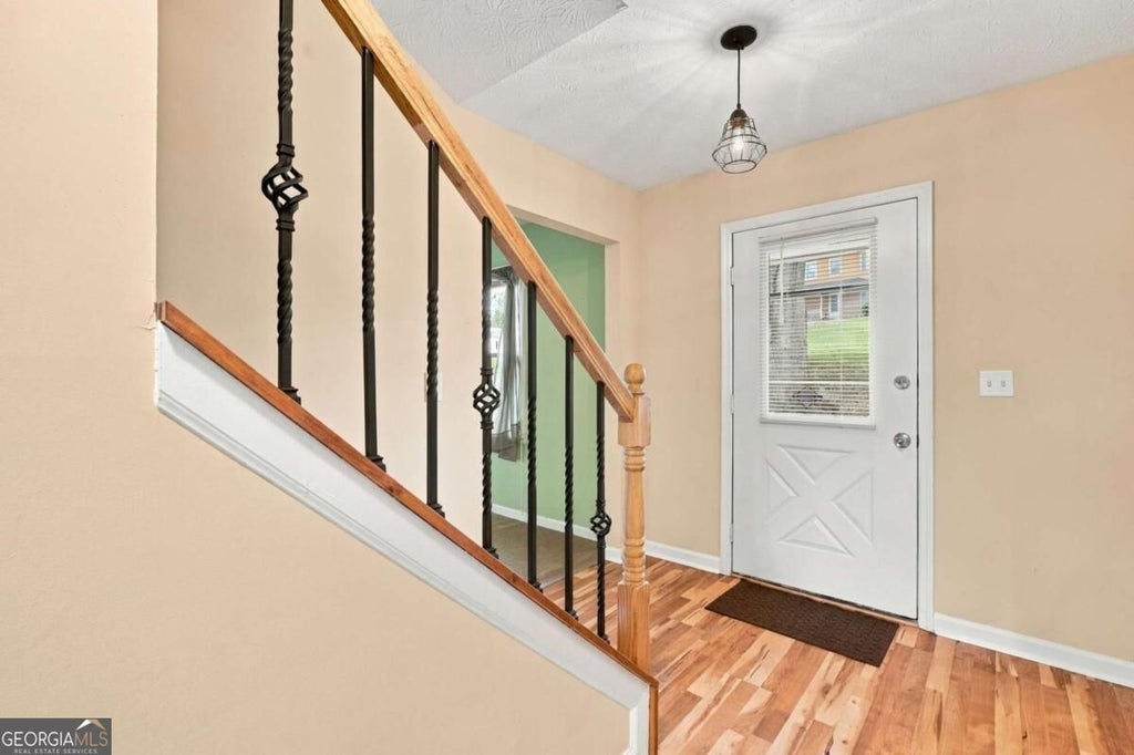Photo of 5004 Brandlwood CT, Lilburn, GA 30047 (MLS # 10869843)