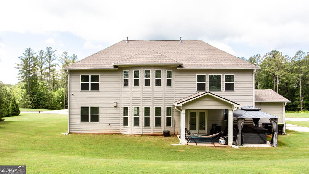 Photo of 496 Genesee Point, Newnan, GA 30263 (MLS # 10799002)