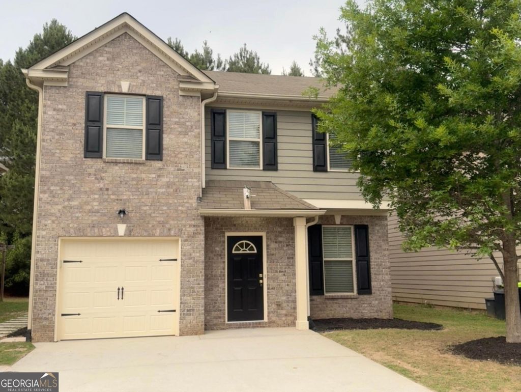 Photo of 5768 Grande River Road, Atlanta, GA 30349 (MLS # 10769097)
