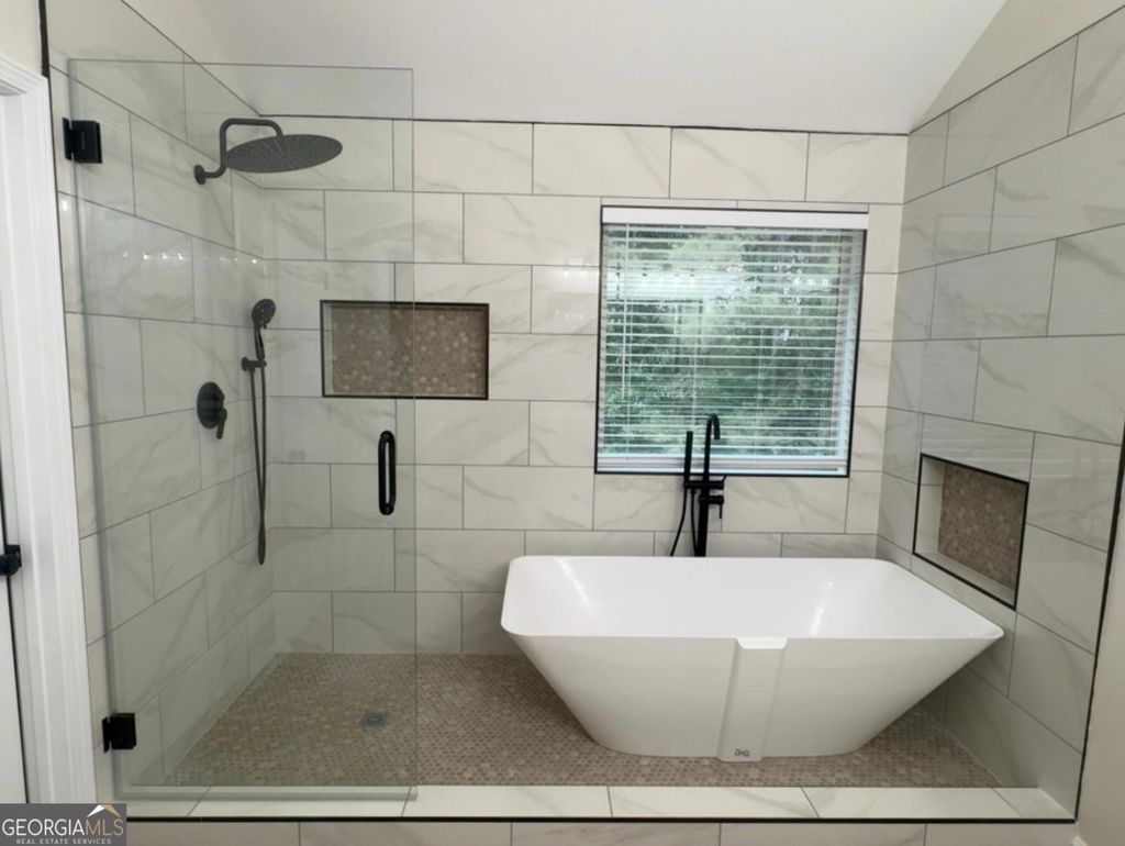 Photo of 5768 Grande River Road, Atlanta, GA 30349 (MLS # 10769097)