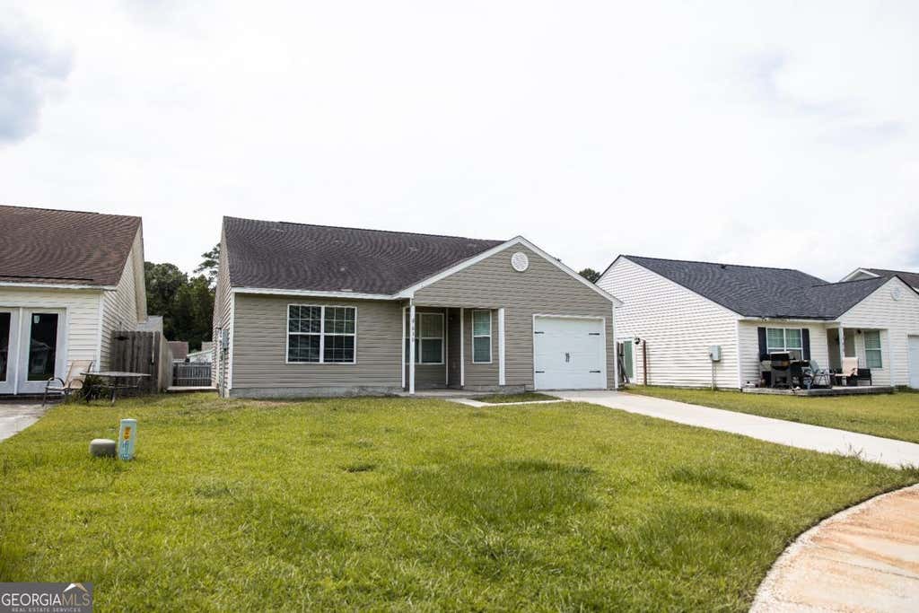 Photo of 630 Rushing Street, Richmond Hill, GA 31324 (MLS # 10782966)