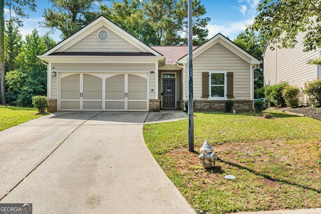 Photo of 1970 Lily Valley Drive, Lawrenceville, GA 30045 (MLS # 10822847)