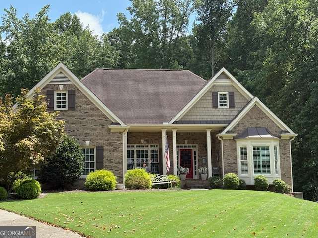 Welcome to this beautifully maintained ranch-style home, ideally situated on a private, quiet, cul-de-sac lot just over an acre in size. Located in the highly sought-after Alpharetta area of Cherokee County, this home offers over 4,000 square feet of thoughtfully designed living space-blending elegance, comfort, and functionality. The main level features a spacious primary suite with a luxurious soaking tub, creating the perfect retreat. The open-concept layout flows seamlessly from the interior living spaces to the backyard, where you'll discover a professionally landscaped oasis complete with a heated gunite pool-perfect for year-round enjoyment. The fully finished, walk-out terrace level is ideal for entertaining or multi-generational living, offering two additional bedrooms, a full bathroom, a second kitchen, and expansive recreation space. Included with the home are two refrigerators, a washer and dryer, a pool table, a large gun safe, and outdoor furniture-making this move-in ready home an exceptional value. Enjoy the tranquility of suburban living while remaining close to top-rated schools, shopping, dining, and more. Schedule an appointment to see this rare gem!
