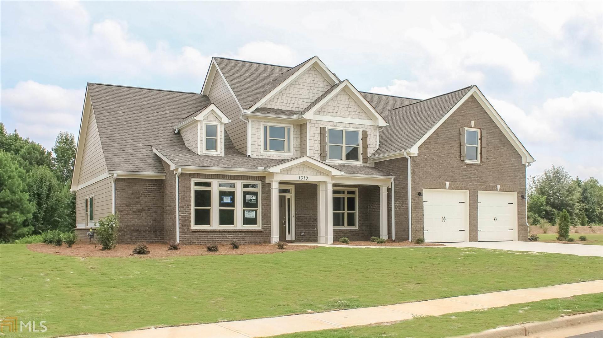 This Frank Betz Copeland House Plan features 4 bedrooms & 3.5 baths. Hardwood floors in family room, dining room, kitchen, keeping room, & Breakfast area. Custom built cabinets & granite countertops throughout. Stainless steel appliances include refrigerator, dishwasher, range & microwave. Custom trim package and tile in all baths & laundry. Laundry room includes sink. Professionally landscaped, sodded & irrigated lawn. The builder is the spouse of listing agent.