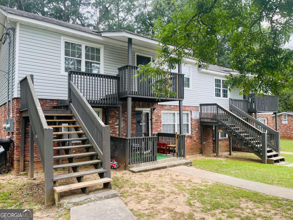 Welcome home! All new floors, new refrigerator, large closet and a conveniently located laundry room off rear deck! Located within walking distance to Downtown Pine Mountain! Must see!