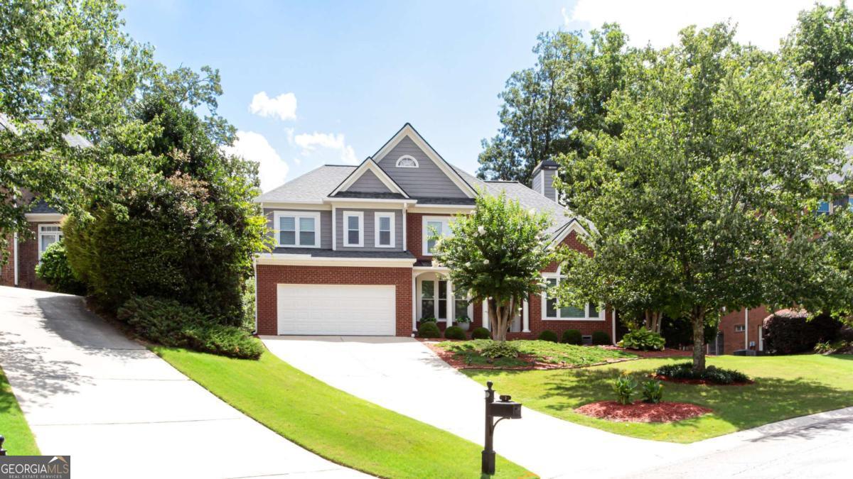 MUST SEE THIS COMPLETELY RENOVATED HOME IN THE DESIRED VININGS ESTATES COMMUNITY! WALK INTO AN OPEN FOYER W/LVP THROUGHOUT MAIN. OPEN CONCEPT W/OFFICE AND DINING/BILLIARD ROOM W/CUSTOM ACCENT WALL. ALL NEW LIGHT FIXTURES & NEW INTERIOR/EXTERIOR PAINT. LIVING ROOM OFFERS A STONE FIREPLACE W/VAULTED CEILINGS, BOOKSHELVES, AND LOTS OF NATURAL LIGHT. ENJOY THE CHEF'S KITCHEN W/GRANITE COUNTERTOPS, ELECTRIC COOKTOP, STAINLESS STEEL APPLIANCES, AND BACKSPLASH TO THE CEILING. RENOVATED FULL BATH W/BEDROOM ON MAIN. EXPLORE THE 2ND FLOOR W/BRAND NEW CARPET, 2 SPACIOUS BEDROOMS W/RENOVATED JACK & JILL BATH W/WALK IN TILE SHOWER & QUARTZ COUNTERTOP. THE SPACIOUS MASTER SUIT EXTENDS A SITTING AREA AND TREY CEILINGS. THE SPA LIKE EN SUITE BATHROOM HAS JETTED TUB W/WALK IN FRAMELESS SHOWER & DOUBLE VANITY W/GRANITE TOPS. ENJOY THE HIS/HERS CUSTOM CLOSETS W/AMPLE SPACE.LARGE PARTIALLY FINISHED ATTIC GREAT FOR STORAGE OR FINISH OUT TO BE A 3RD LEVEL. BE ENTERTAINED BY THE OVERSIZED FENCED IN BACKYARD W/EXTENDED NEWER TREX DECK W/HOT SPRING HOT TUB (STILL HAS WARRANTY), & FIRE PIT. ALL NEW WINDOWS INSTALLED 2023, NEW HOT WATER HEATER, NEW 2.5 INCH FAUX BLINDS. Vinings Estates is an active swim/tennis community conveniently located minutes to I-285 with easy access to the airport, Buckhead & Midtown with lower Cobb County taxes. Whitefield Academy/Heritage Park/The Battery/Truist Park/Smyrna Market Village & the Silver Comet Trail are also nearby. Community amenities include: 3 Pools, 2 clubhouses, 8 tennis courts/pickleball, basketball court, playground, fitness center, swim team & often planned community events. This is a must see!