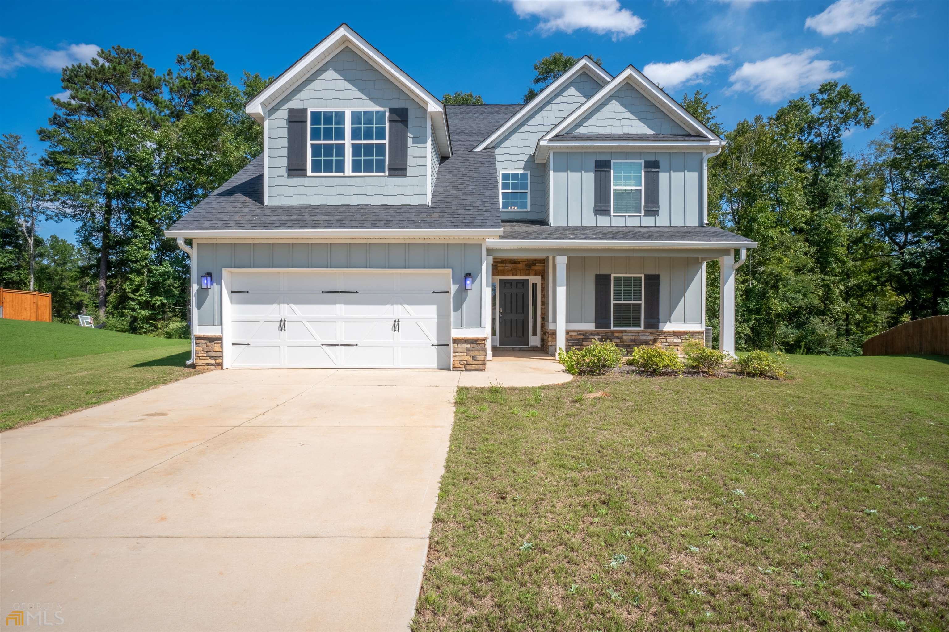 Come check out this gorgeous practically brand new popular 4BR/3.5BA 2,671 Sq. Ft. Aspen Floor Plan by Hughston Homes here in the Fastest Growing Community in Monroe County, Juliette Crossing. This Energy Efficient home features the latest Smart Home Technology in which the modern Open Kitchen Concept allows you to entertain with ease. Offering a large granite kitchen island, pantry & stainless-steel appliances. Warm up by the fireplace in Great Room or retreat upstairs to the Media Room. Owner's Suite located on main level includes over-sized walk in closet, two separate vanities, shower & separate garden tub. Convenient cubbies located inside the owners entry & main floor laundry room. Hardwoods in living areas & tiled wet areas 100% USDA Financing Available. Hurry...this home WON'T LAST LONG. Make your appointment today!!!
